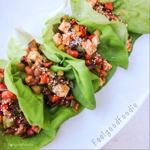 These Honeyed Chinese Chicken Wraps are loaded with savory stir-fry chicken and colorful veggies - a low-carb easy weekday meal!