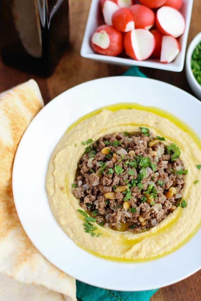  Hummus with Ground Beef in a white bowl 