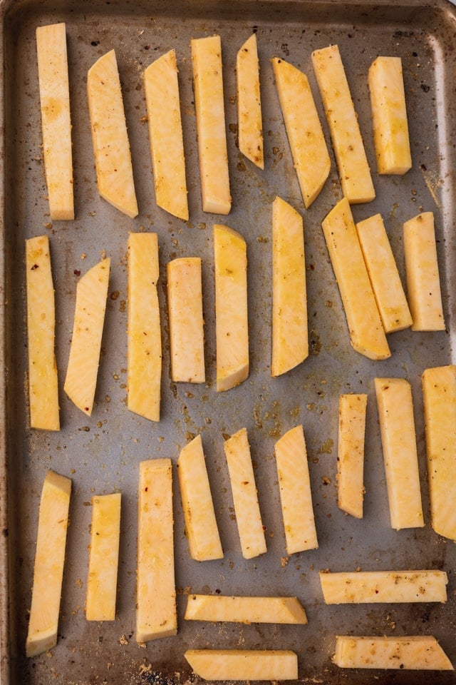 Cut rutabaga lined up on a tray