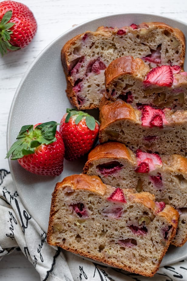 Final strawberry banana bread sliced on a plate