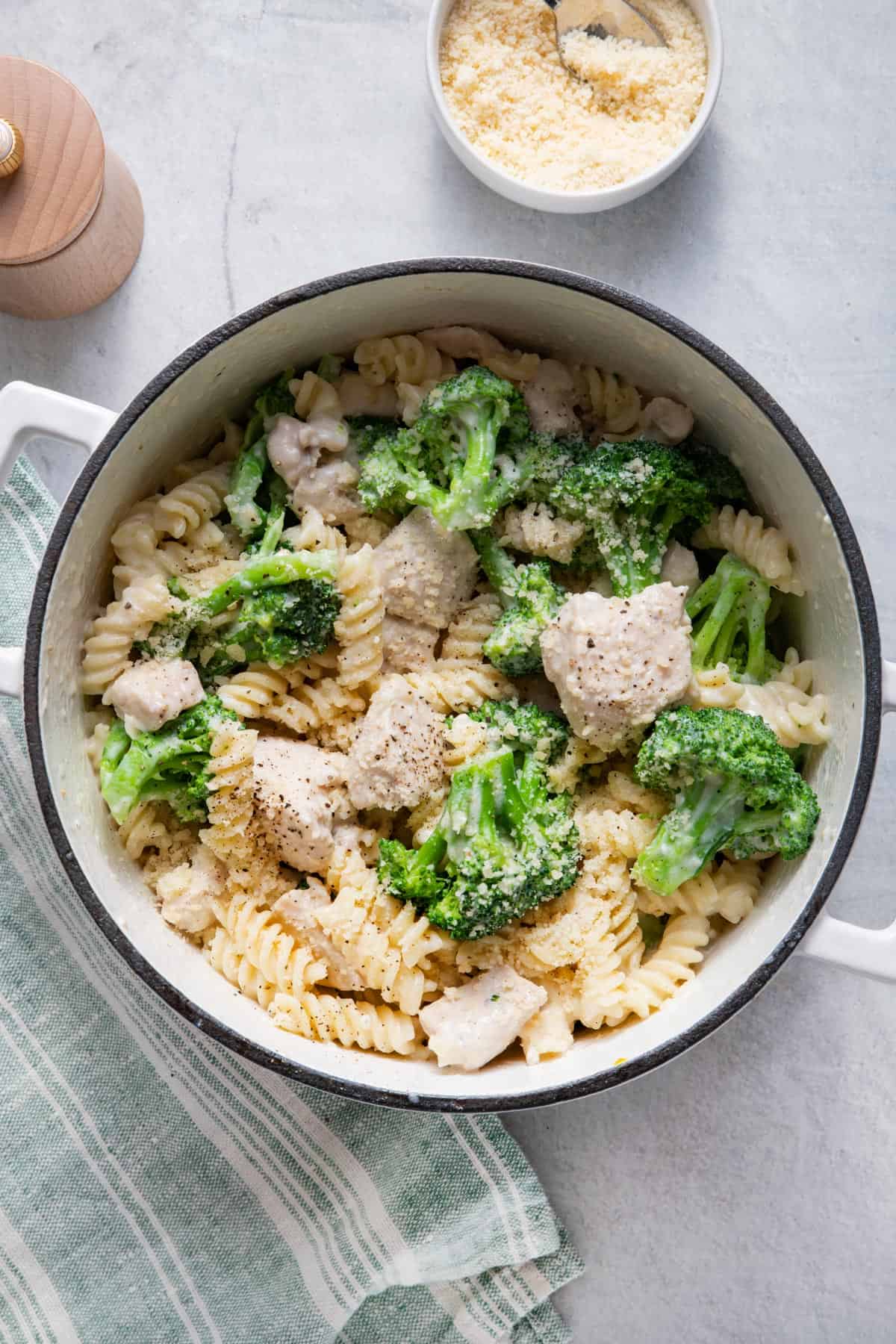 Large pot of broccoli chicken alfredo with a creamy lightened up sauce