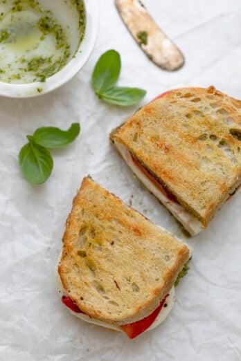 Grilled Mozzarella Sandwich made with walnut pesto, tomatoes and roasted red peppers