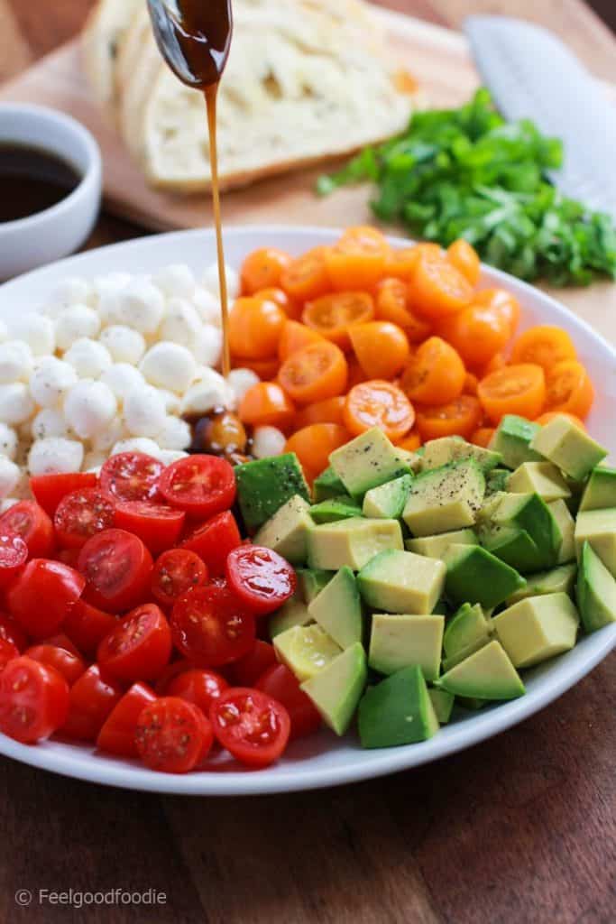 This Avocado Caprese Salad is colorful, refreshing and bursting with fresh flavor. It's a perfect appetizer or side dish to make that everyone will enjoy!
