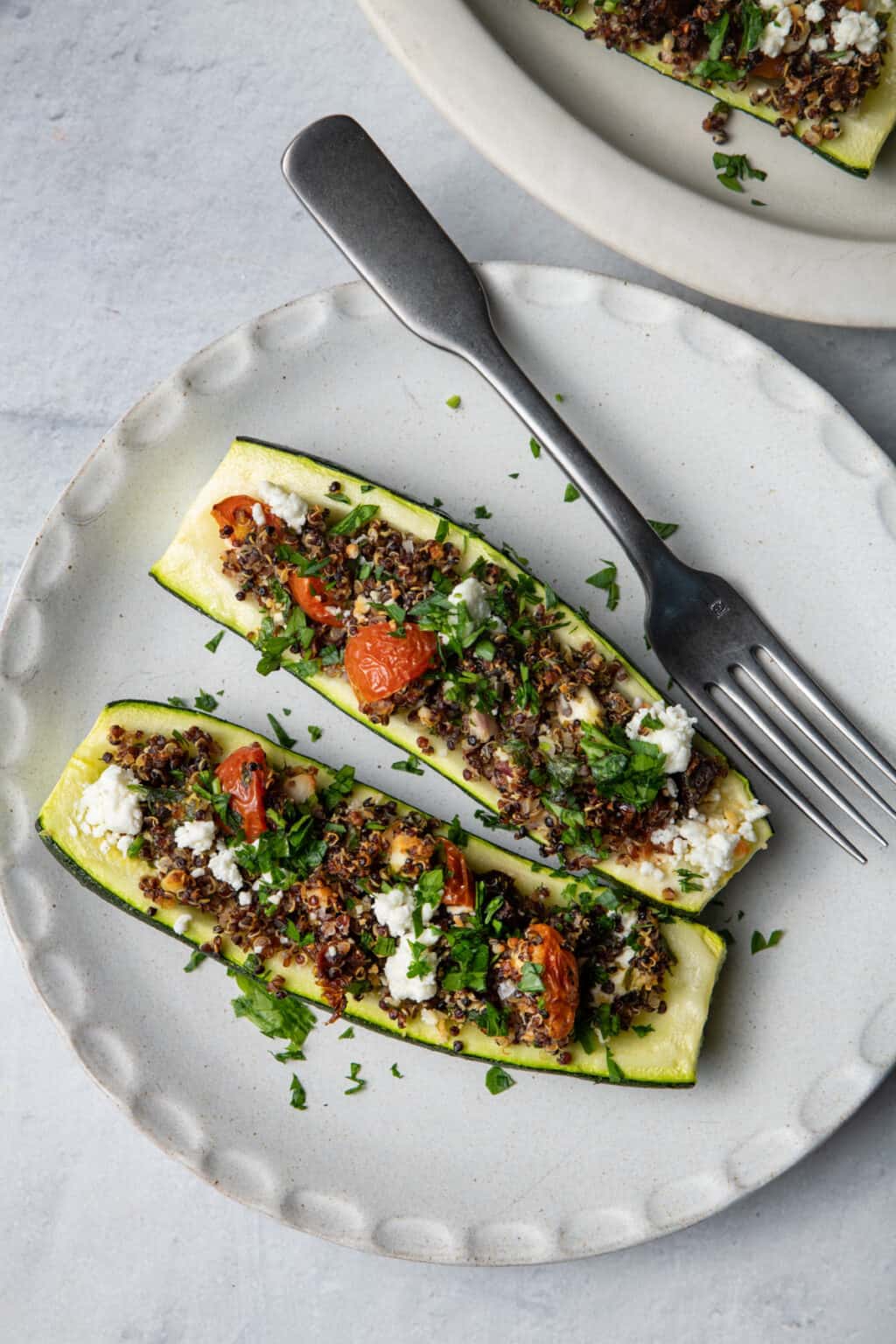 Quinoa Stuffed Zucchini Boats {Vegetarian Recipe} - FeelGoodFoodie