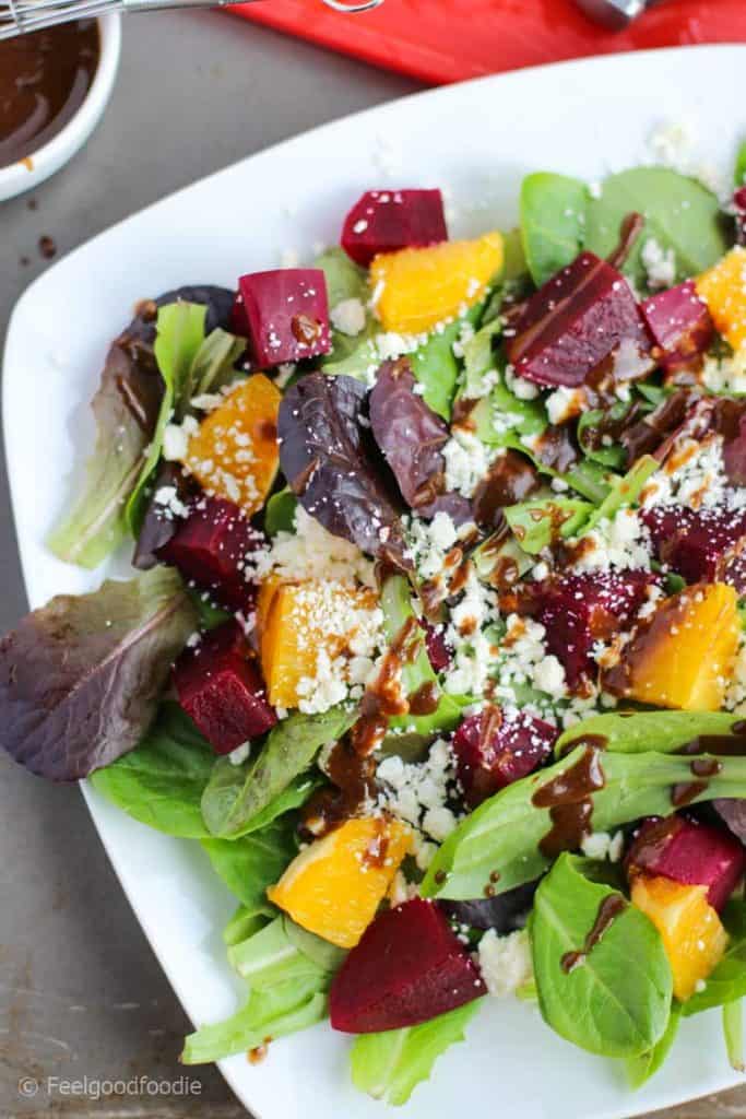 Orange Red Beets Feta Spring Salad on a white dish