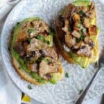Mushroom avocado toast on a plate