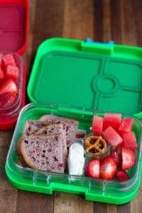 Lunchbox: Cranberry and seed whole wheat bread with cream cheese, fruit and pretzels.