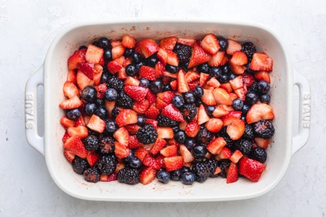 top down shot of berries in a white dish