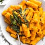 Final Pumpkin Pasta recipe plated in a large bowl and served with crispy sage