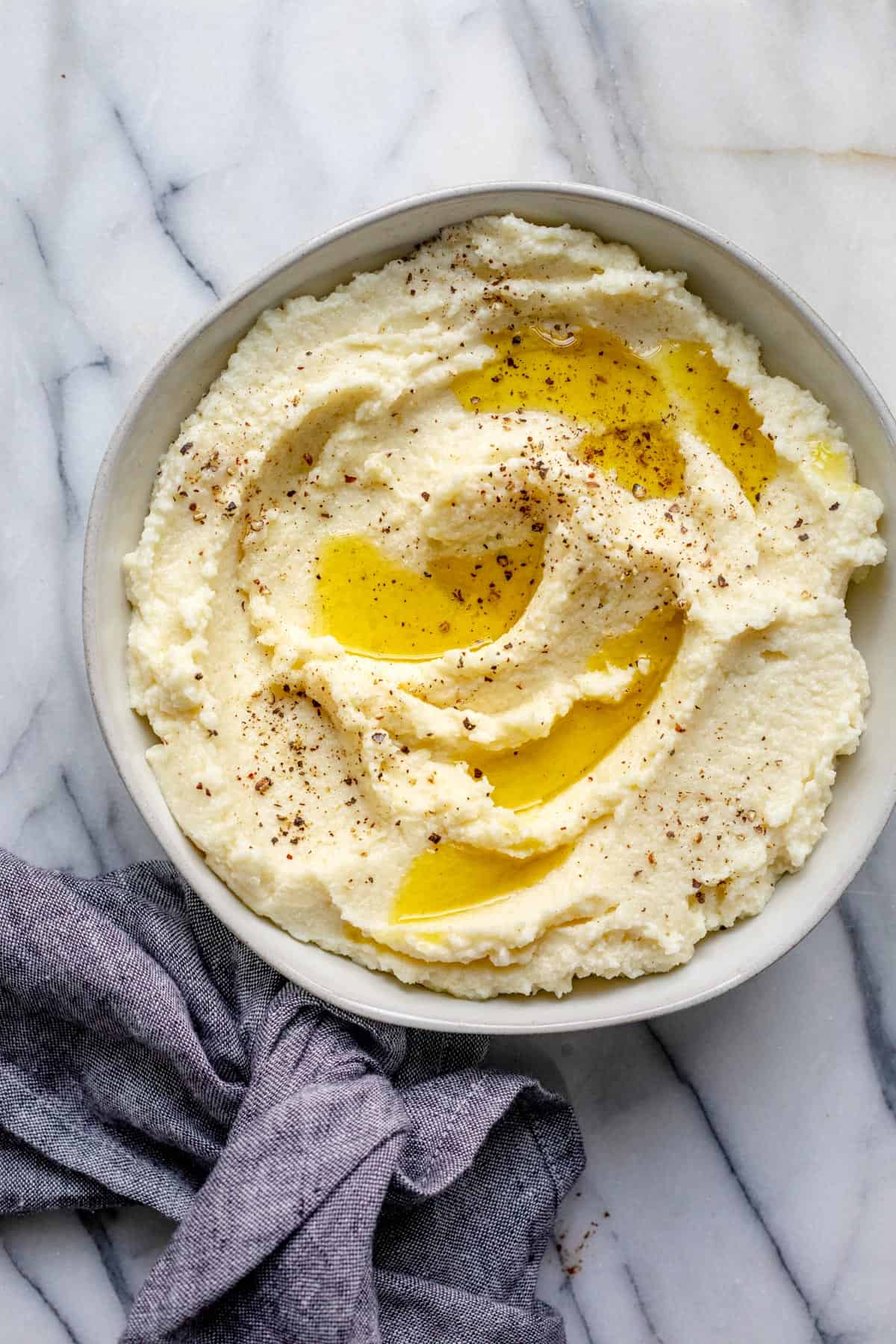 Cauliflower Mashed Potatoes in a bowl and topped with chives