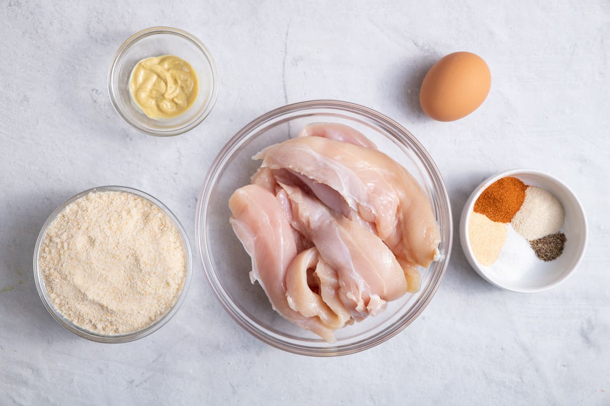 Ingredients to make chicken tenders in the oven