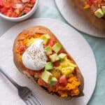 Loaded breakfast sweet potatoes with eggs and toppings