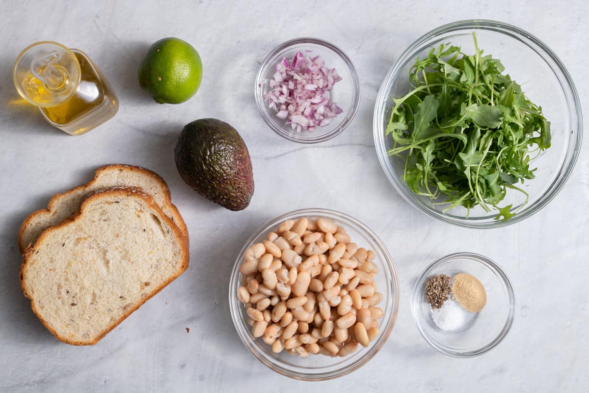 Ingredients to make the avocado sandwich with white beans
