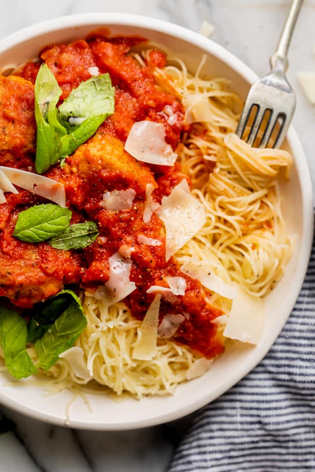 Chicken meatball recipe with marinara served over pasta