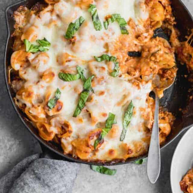 overhead shot of baked pasta with ground turkey in a skillet