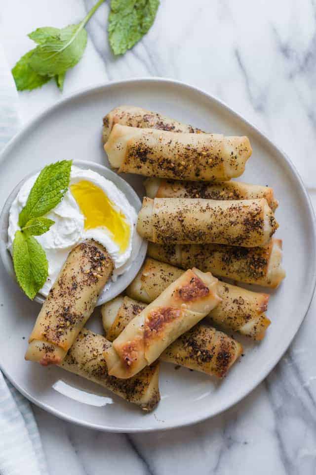 This zaatar spring rolls on a white plate