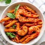Arrabiata pasta with shrimp in a small pasta bowl