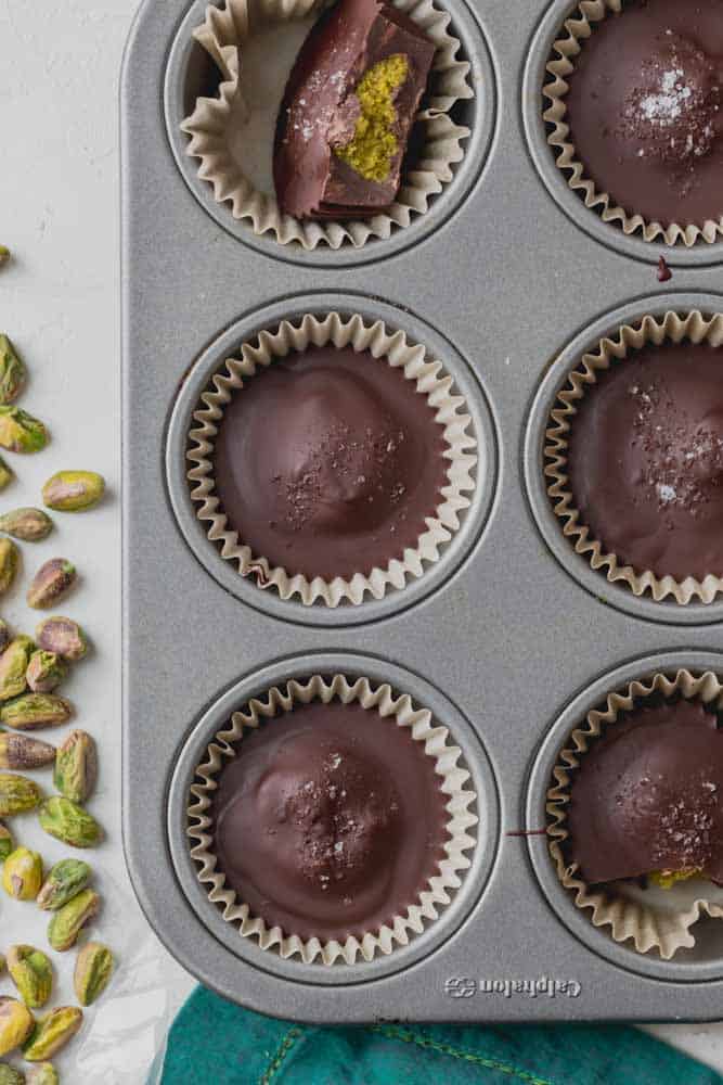 overhead shot of Pistachio Butter Cups in baking tray