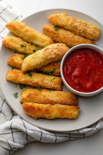 Plate of halloumi fries served with marina sauce