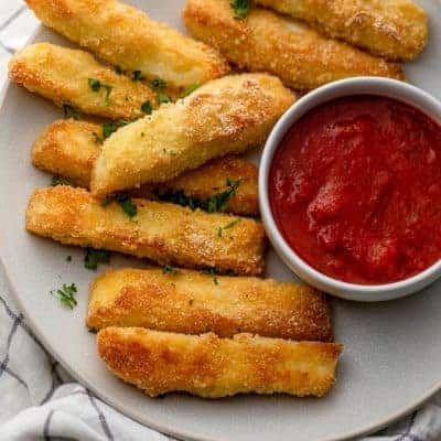Plate of halloumi fries served with marina sauce