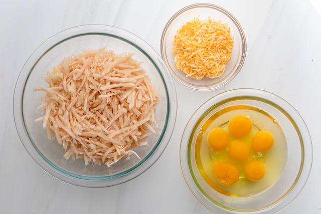 Three ingredients to make the recipe: potatoes, eggs, cheese