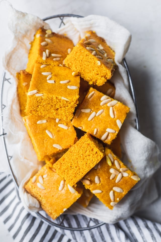 Large basket of sfouf cut into squares ready to be served