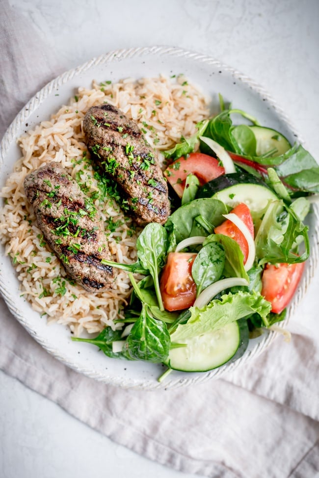 This is a Lebanese style beef kafta on a bed of rice
