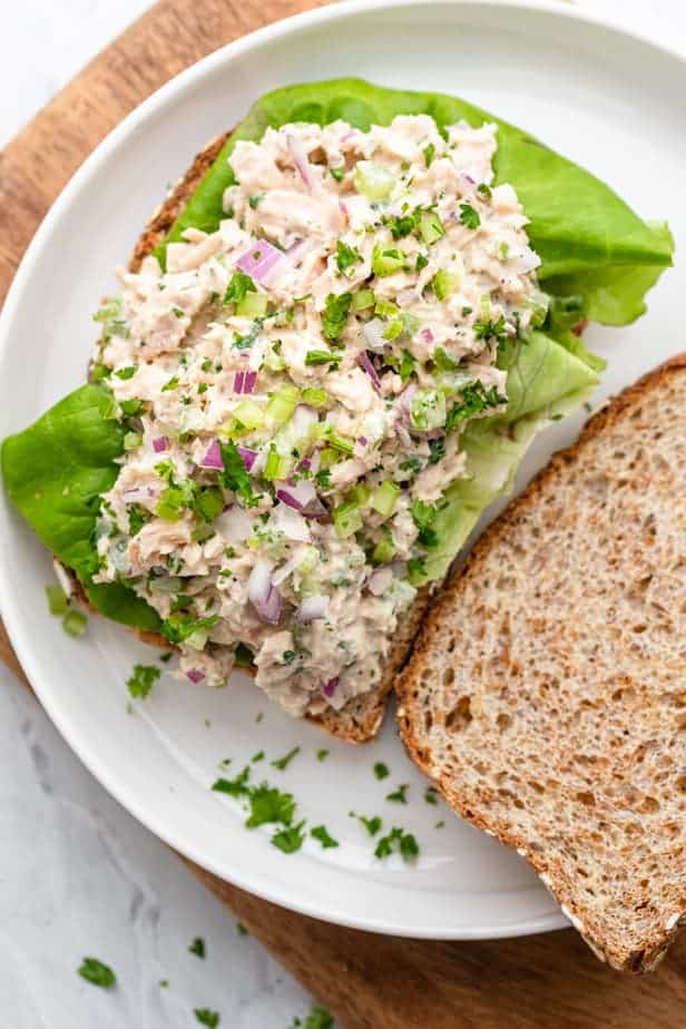 Tuna salad on a slice of bread with lettuce