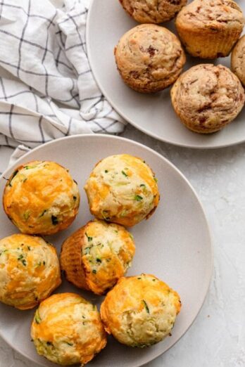 Two kinds of toddler muffins on plates - savory and sweet kinds