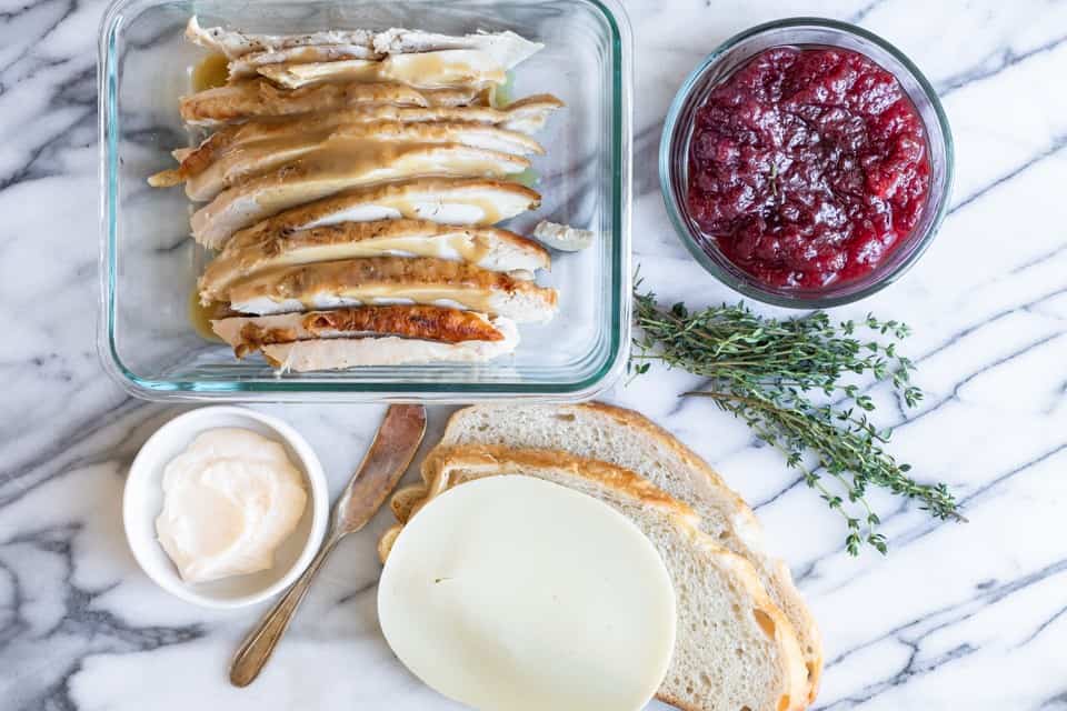 The ingredients needed to make a turkey panini.