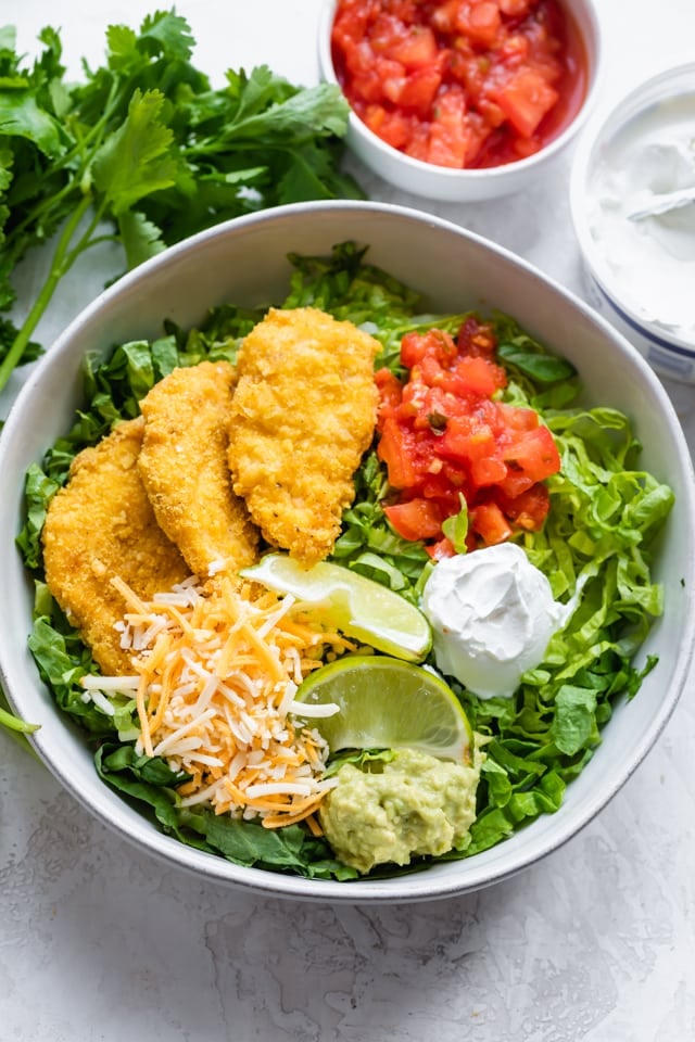 Tortilla Crusted Chicken served on top of a salad