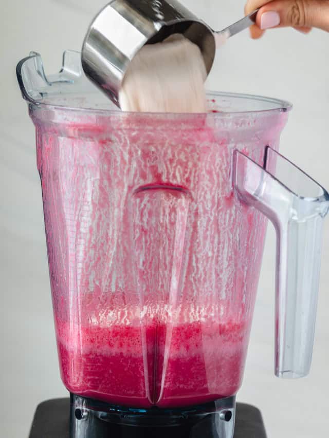 Adding the dry ingredients to the same blender.