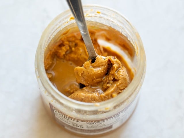top down shot of peanut butter in a jar