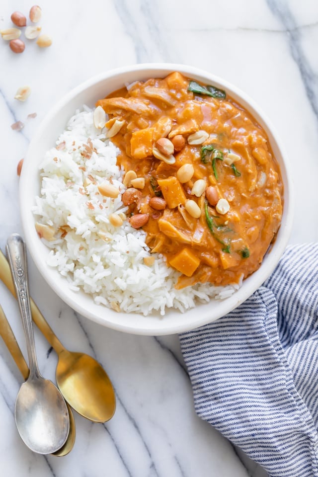 Final dish of West African Peanut Soup served over white rice