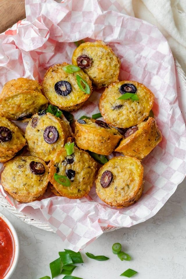 Pizza quinoa bites out of the oven in a serving platter