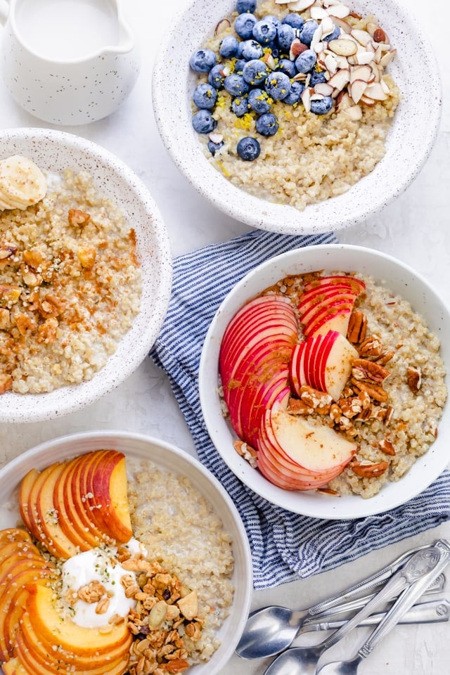 4 bowls of oatmeal with different toppings