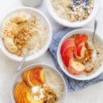 Quinoa oatmeal served with a variety of toppings for breakfast