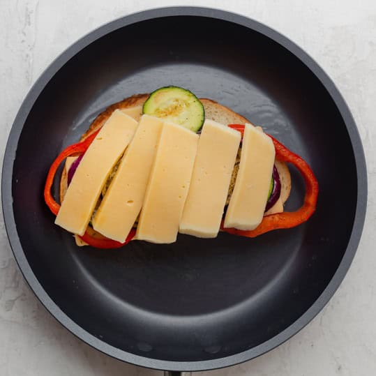 Second layer of cheese added on top.