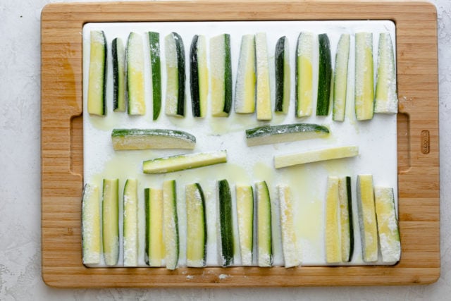 Zucchini spears coated with olive oil spray