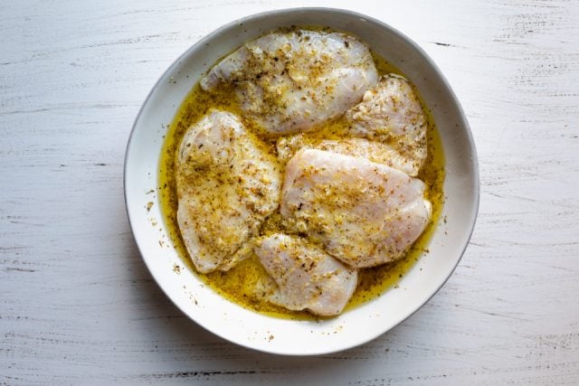 Chicken breasts in bowl after half hour of marinating