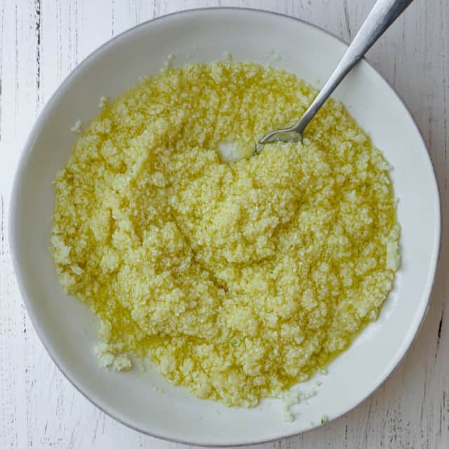 Lemon and olive oil added to the bowl.