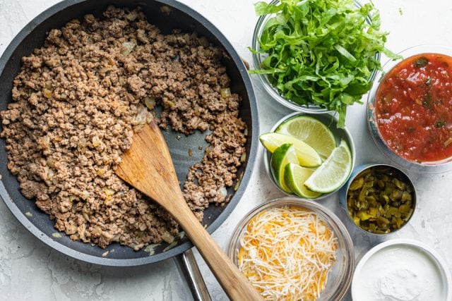 Ingredients for the recipe: taco beef, lettuce, salsa, cheese, green chiles