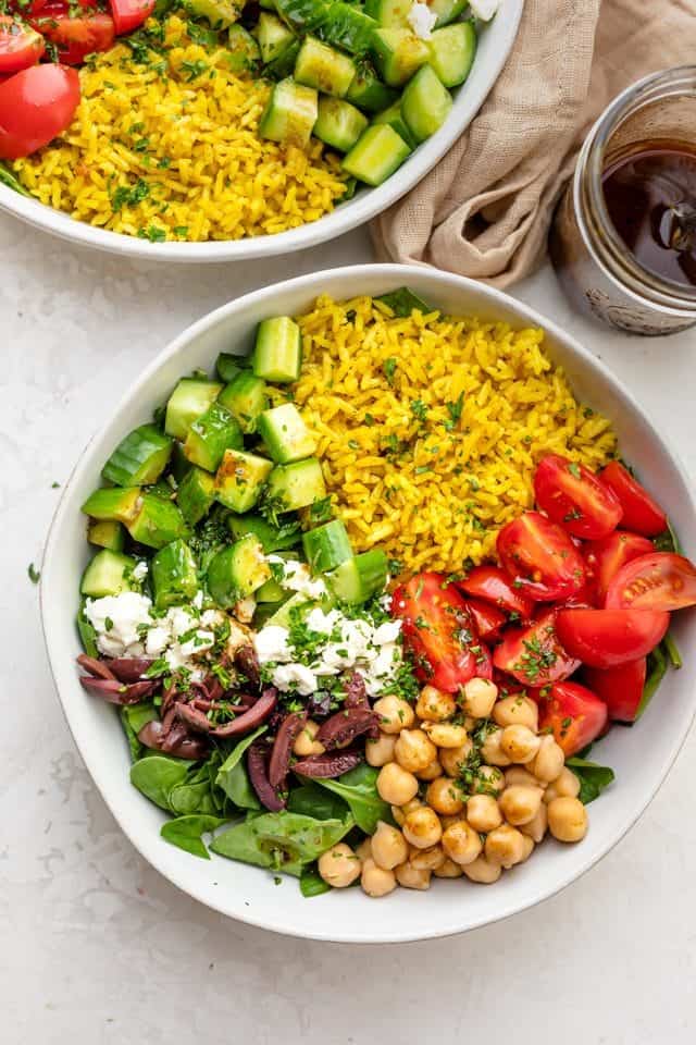 Turmeric rice salad with dressing on top