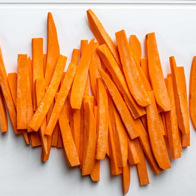 Cut fries of raw sweet potatoes.