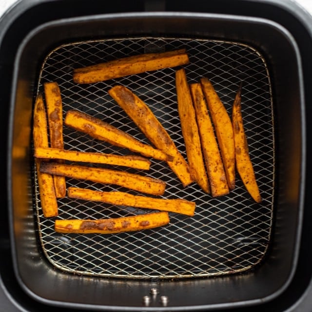 Sweet potato fries in air fryer after cooked.