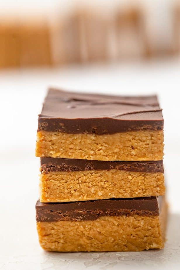 Vertical stack of 3 chocolate peanut butter bars