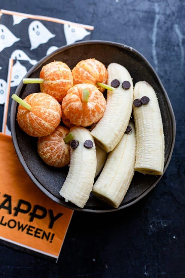 Halloween Themed Food - Final plated ghost bananas and tangerine pumpkins