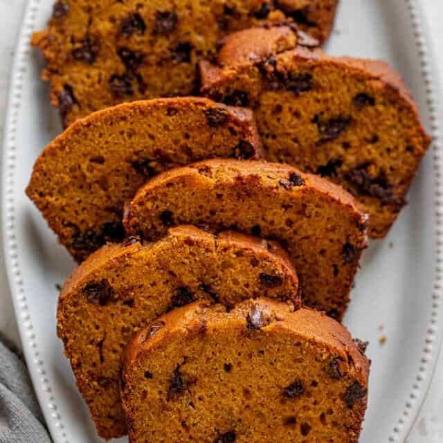 Pumpkin Chocolate Chip Bread after baking, sliced and place in a large dish