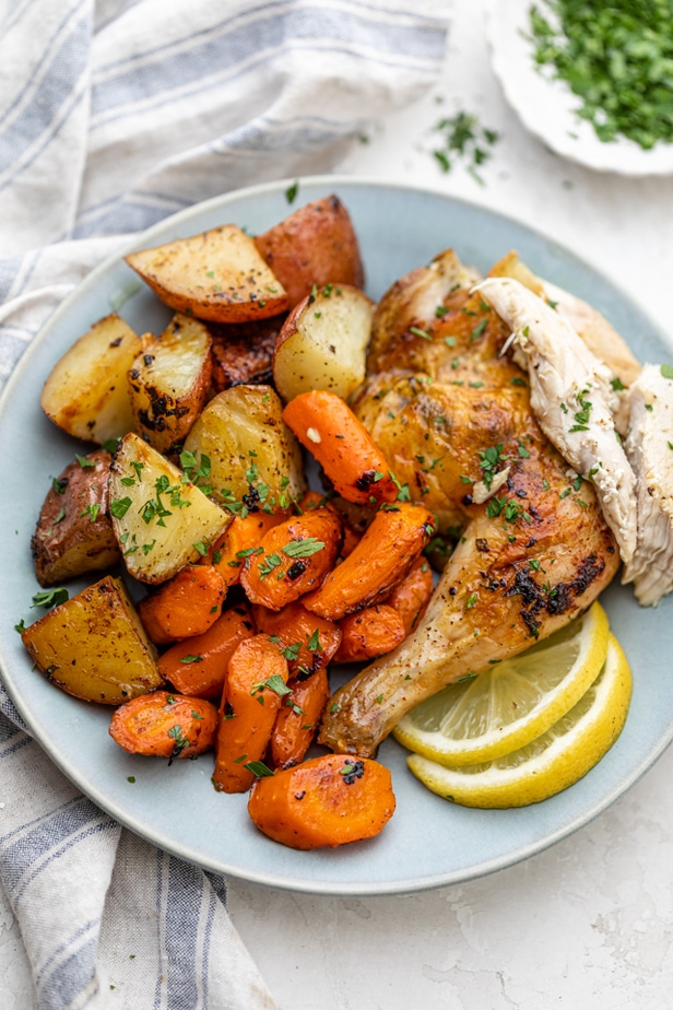 Single serving of the roasted chicken with potatoes and carrots potat
