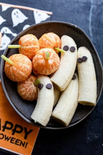 Halloween Themed Food - Final plated ghost bananas and tangerine pumpkins